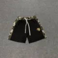 Casual streetwear shorts with camo side panels, drawstring waist and bold embroidery. - S / Bottoms / Black Shorts