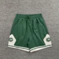 Green color block sports shorts with elastic drawstring waist and stylish letter print. - S / Bottoms / Green