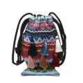 Sac seau pour femme style ethnique avec motifs tissés vibrants et pompons colorés. - Bleu lac
