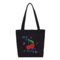 Sac cabas décontracté en toile noire avec joli imprimé cerise pour les trajets quotidiens. - Style Vertical / Noir