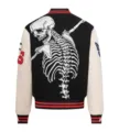 Detailed view of the streetwear black and white varsity jacket with skeleton embroidery. - S / Style 1