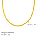 Collar de cadena de espiga dorada vista detallada, accesorio de joyería de acero plano. - Collar Cadena de Serpiente Dorado