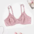 Detailed view of the pink lace bra showing delicate floral patterns and soft fabric texture. - 38/85C / Pink