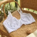 White lace underwire bra with delicate floral mesh cups and bow detail for women style. - 85C / Tops / White