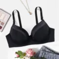 Black push up seamless bra with adjustable straps for women, comfortable daily wear. - Black