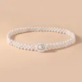Elegant faux pearl waist chain for women, versatile thin belt with flower buckle for dress suits - Conch Silver