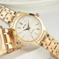 DINUO montre quartz minimaliste en acier inoxydable dore pour homme et femme etanche - Tout Or Cadran Blanc Femme
