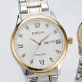 Montre à quartz en acier inoxydable pour couple avec calendrier et strass brillants. - Cadran Blanc Bracelet Deux Tons Hommes