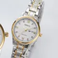 Montre à Quartz en Acier Inoxydable Bicolore DINUO avec Cadran Blanc et Date - Cadran Blanc Bracelet Deux Tons Femmes