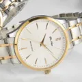 Elegant two-tone quartz watch with a white textured dial, steel strap, and waterproof. - Two Tone White Dial Men