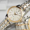 DiNuo waterproof quartz watch with stainless steel strap for men and women minimalist. - Two Tone White Dial Women