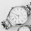 Silver stainless steel quartz watch with white dial and classic minimalist design for daily wear. - Silver Case White Dial Men