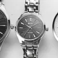 Stainless steel quartz wristwatch with metal strap waterproof design for men and women. - Silver Case Black Dial Women