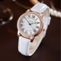 Elegant women's quartz watch with white leather strap, rose gold crystal bezel and Roman numerals. - White