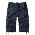 Close-up detail of men's cotton cargo capri shorts, multi-pocket casual loose trousers dark blue. - Navy Blue