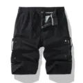 Men's black cargo shorts detail view, featuring multiple utility pockets, zipper and waist. - Black