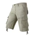 Detailed view of men's casual khaki cargo shorts with multiple pockets and hem drawstrings. - Khaki