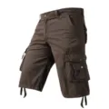 Detailed view of men's brown cargo shorts featuring multi-pockets and adjustable leg drawstrings. - 30 / Coffee