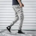Men's grey casual cargo pants with multiple pockets, slim fit tactical trousers for daily wear. - 29 / Grayish White