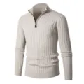 Detailed view of the ribbed knit texture, half-zip collar design, and fine stitching. - M / White