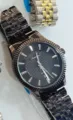 Orologio al quarzo da uomo Lanturun con cinturino in metallo nero e utile datario. - Canna di fucile quadrante nero