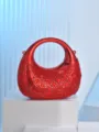 Red metallic moon evening bag featuring sparkling rhinestones for chic party styling. - Red