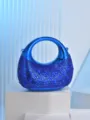 Close-up detail of the stunning blue metallic rhinestone evening bag with sparkling gems. - Blue