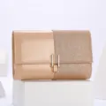 Elegant women's evening clutch bag with chic split design, sparkly glitter and glossy patent leather. - Champagne Gold