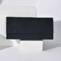 Detailed view of dark glitter evening clutch bag with chic diagonal textured pattern and flap. - Navy Blue