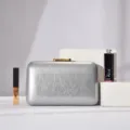 Silver cracked texture evening clutch bag detail view, elegant metal clasp accessory. - Silver