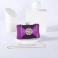 Exquisite purple glitter evening clutch bag with sparkling crystal flower detail and chain. - Violet