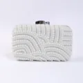 Handmade pearl beaded evening clutch bag with elegant metallic clasp for weddings and parties. - Silver