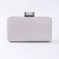 Silver glitter evening clutch bag detail, elegant metallic clasp, exquisite party handbag closeup. - Light Gray