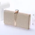 Gold glitter evening clutch bag for women with crystal flower clasp and metal frame. - 22x4.5x14cm / Gold