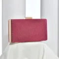 Detailed shot of glittering evening clutch bag with gold-tone clasp, elegant party accessory. - Rose Red