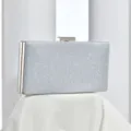 Silver glitter clutch bag with metal clasp, elegant evening party accessory for women. - Silver