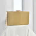 Stunning close-up view of gold glitter evening clutch showcasing exquisite metal frame. - Gold