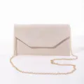 Glitter suede evening bag detail showing envelope flap design and gold chain strap close-up. - Gold