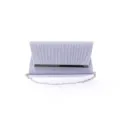 Silver glitter evening bag detail showing pleated texture, metal bar, and chain strap. - Light Blue