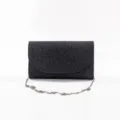 Black glitter evening clutch bag close-up, featuring sparkling sequin texture and chain. - Black