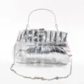 Silver pleated PU clutch bag detail, metal top handle and chain strap for evening events. - Silver
