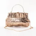 Metallic pleated evening clutch bag with metal arch handle and chain strap detail. - Pink