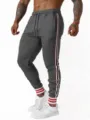 Heren casual joggingsbroek met stijlvolle zijstrepen en comfortabele slim fit pasvorm. - donkergrijs