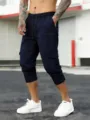 Pantalon cargo Capri décontracté pour homme avec taille élastique et poches multiples. - S / Bleu marine