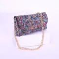 Elegant sparkling rhinestone evening bag with gold chain strap detail for party and events. - Colorful