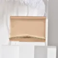 Elegant rose gold clutch evening bag with metallic wave edge for women parties and weddings. - Champagne