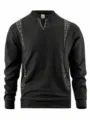 Vue détaillée du pull élégant à manches longues pour homme, avec motif à carreaux unique et tissu doux. - S / Noir