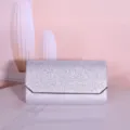 Silver glitter evening clutch bag detail showing sparkling texture and metallic frame edge. - 22*6*12cm / Silver