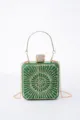 Green rhinestone evening clutch bag detail, sparkling crystals, metallic handle and chain. - Green