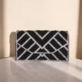 Black beaded evening clutch with shimmering rhinestone geometric pattern for women banquet. - Black